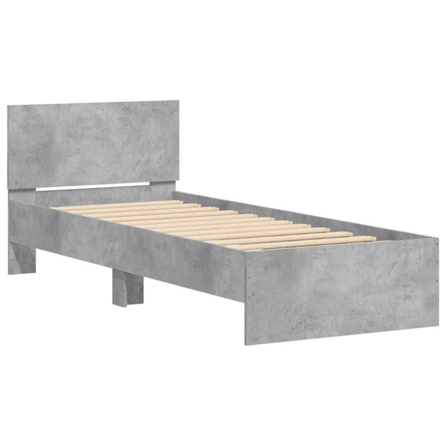 Bedframe met hoofdbord en LED-verlichting betongrijs 90x190 cm