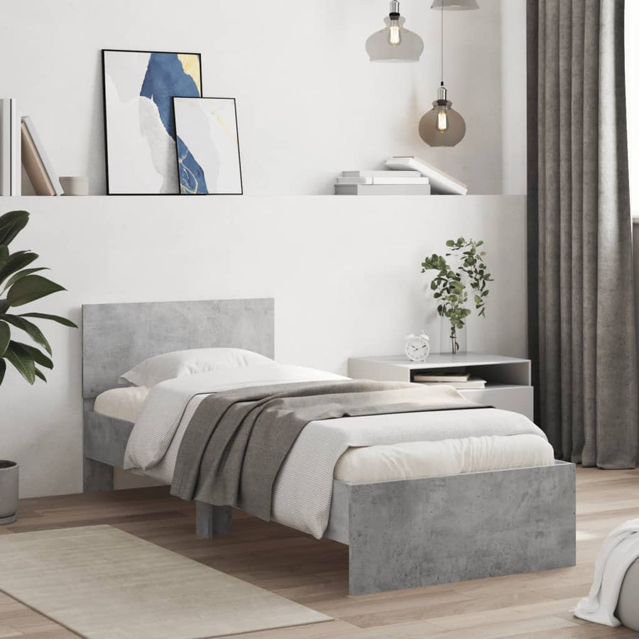 Bedframe met hoofdbord en LED-verlichting betongrijs 90x190 cm