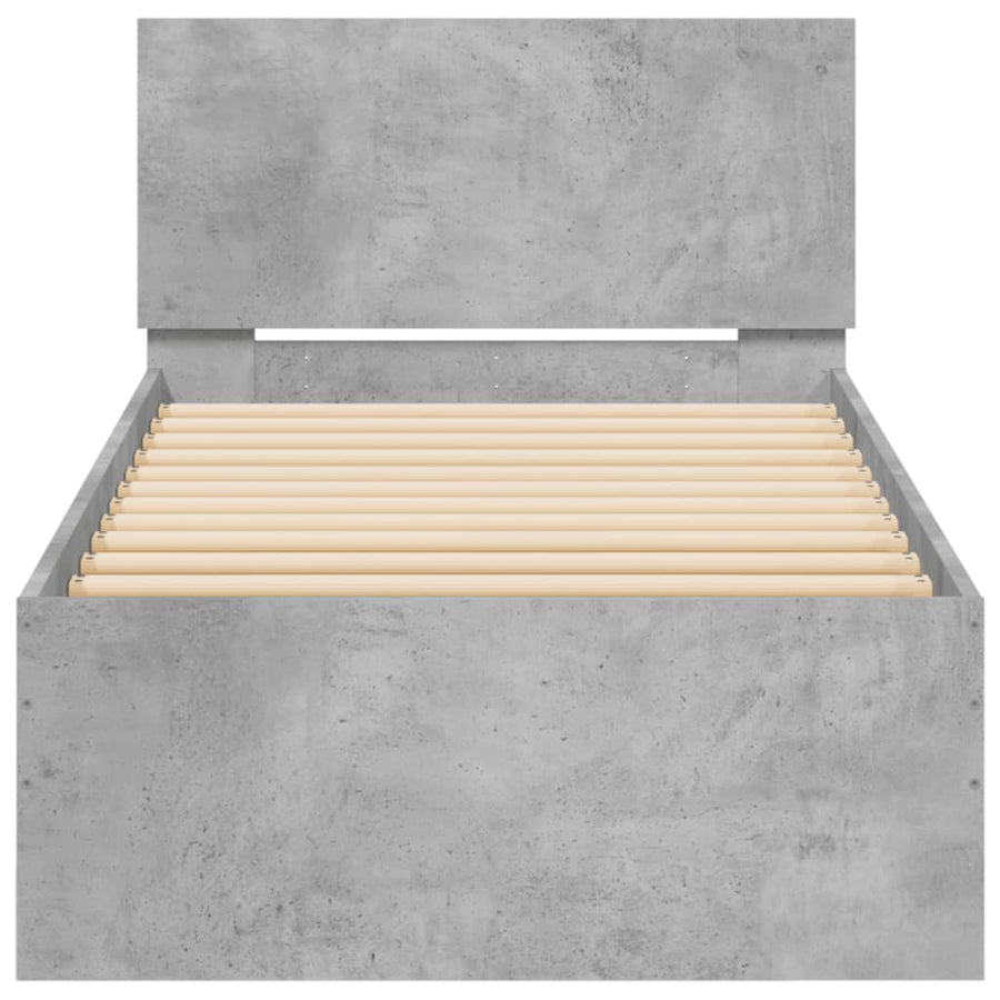 Bedframe met hoofdbord en LED-verlichting betongrijs 90x190 cm