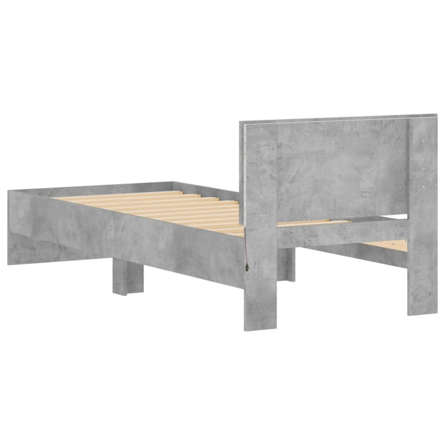 Bedframe met hoofdbord en LED-verlichting betongrijs 90x190 cm