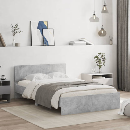 Bedframe met hoofdeinde betongrijs 120x190 cm