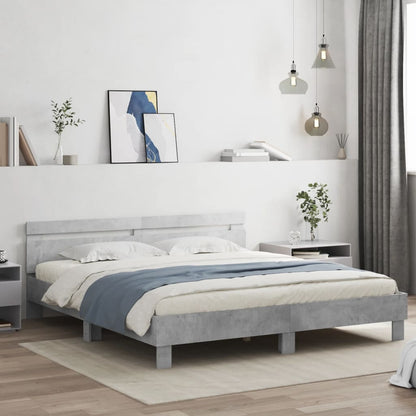 Bedframe met hoofdeinde en LED-licht betongrijs 180x200 cm