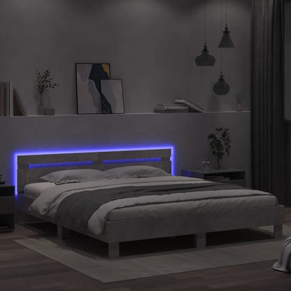 Bedframe met hoofdeinde en LED-licht betongrijs 180x200 cm