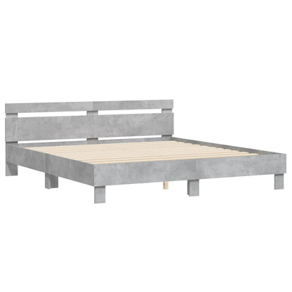 Bedframe met hoofdeinde en LED-licht betongrijs 180x200 cm