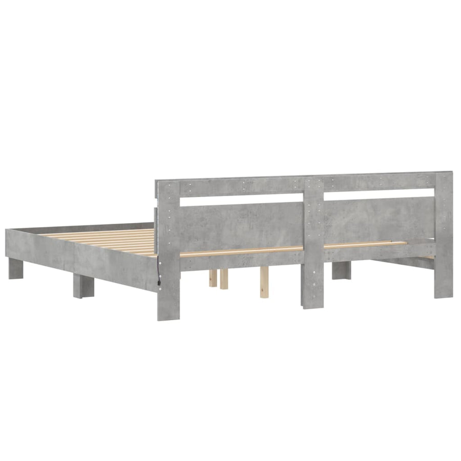 Bedframe met hoofdeinde en LED-licht betongrijs 160x200 cm