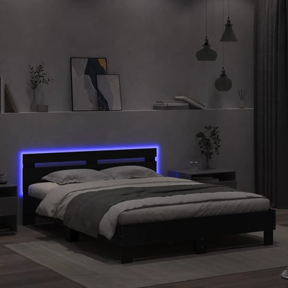 Bedframe met hoofdeinde en LED zwart 140x200 cm