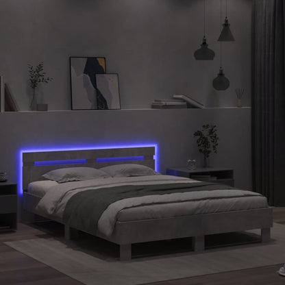 Bedframe met hoofdeinde en LED betongrijs 140x190 cm