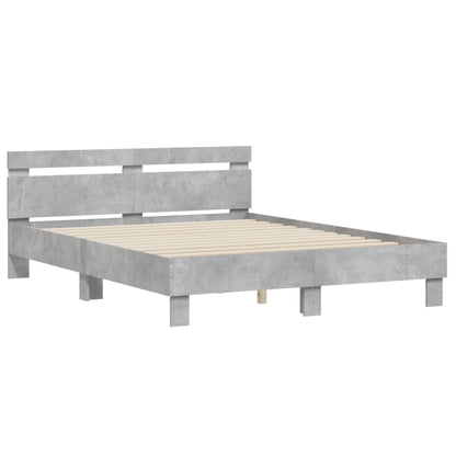 Bedframe met hoofdeinde en LED betongrijs 140x190 cm