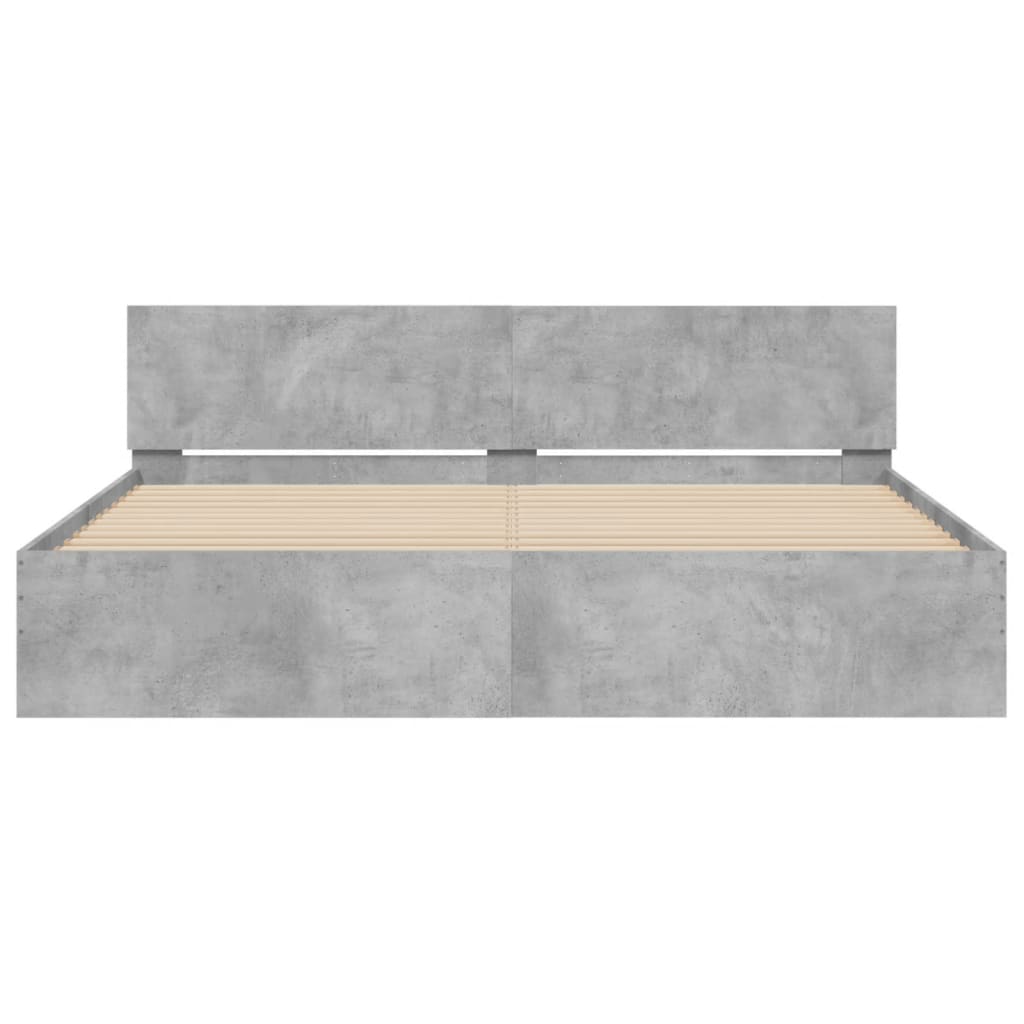 Bedframe met hoofdeinde en LED-licht betongrijs 180x200 cm