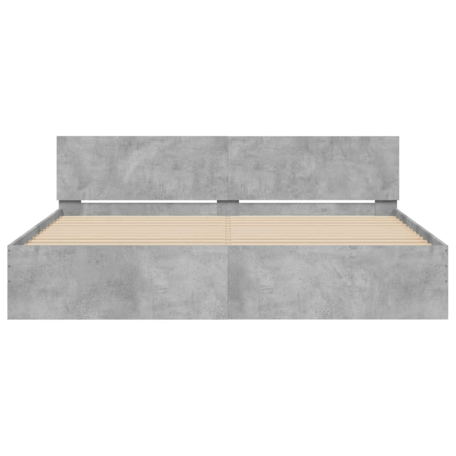 Bedframe met hoofdeinde en LED-licht betongrijs 180x200 cm