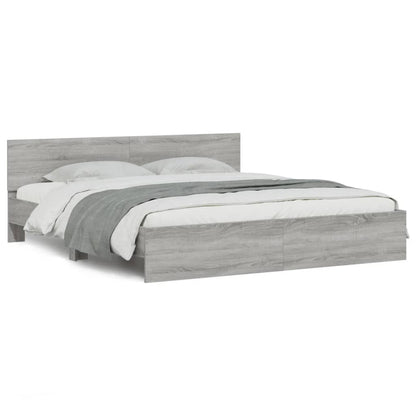 Bedframe met hoofdeinde en LED-licht grijs sonoma 180x200 cm