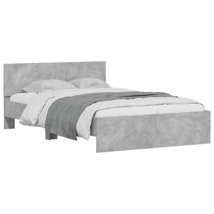 Bedframe met hoofdeinde en LED betongrijs 140x200 cm