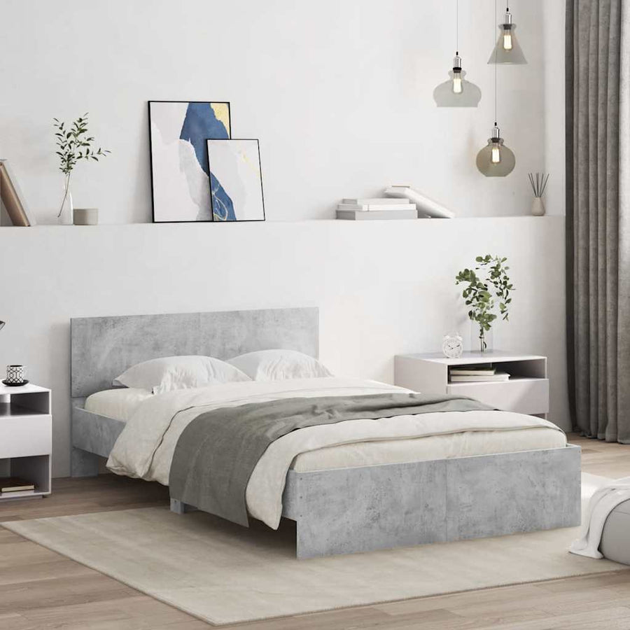 Bedframe met hoofdeinde en LED betongrijs 140x190 cm