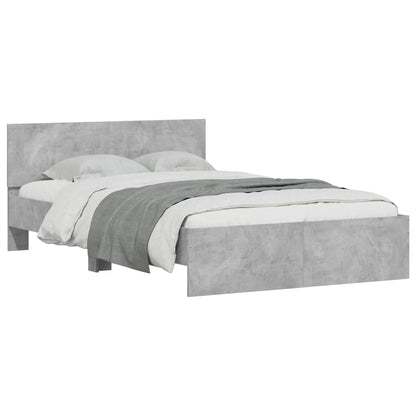 Bedframe met hoofdeinde en LED betongrijs 140x190 cm