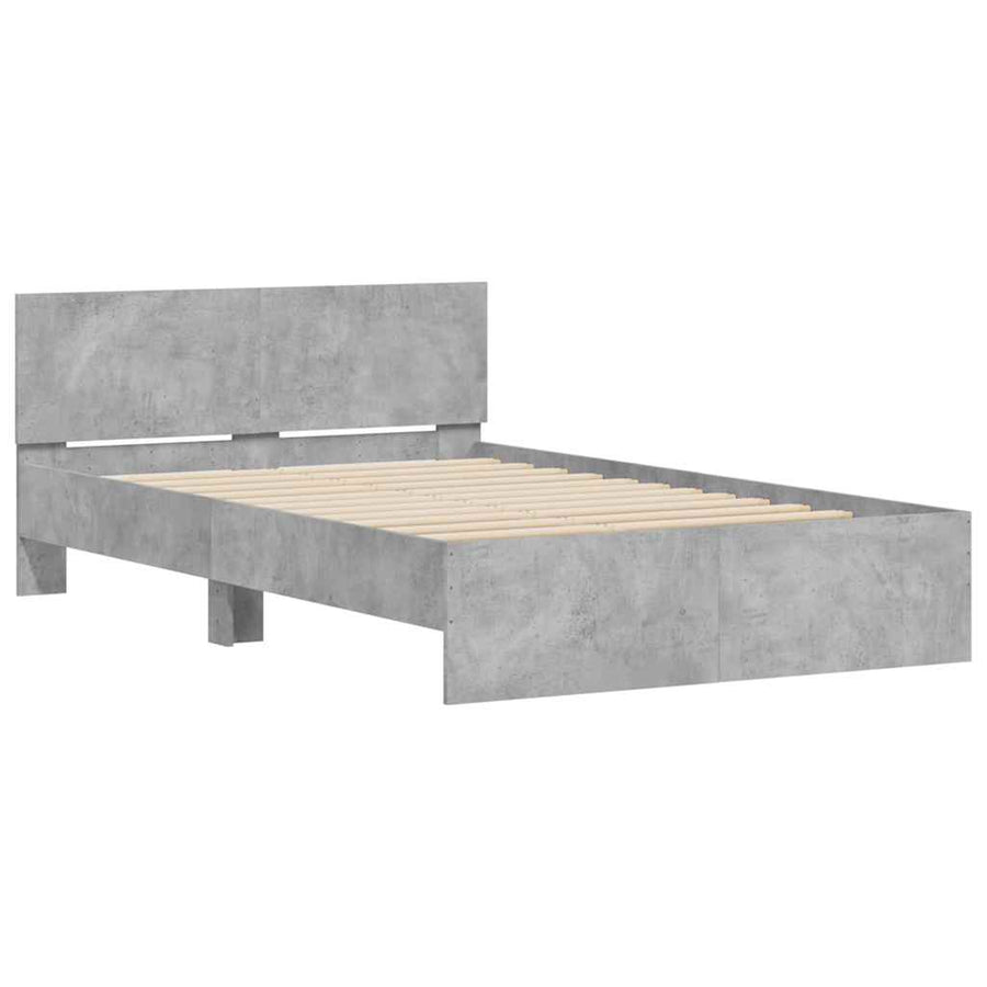 Bedframe met hoofdeinde en LED betongrijs 135x190 cm