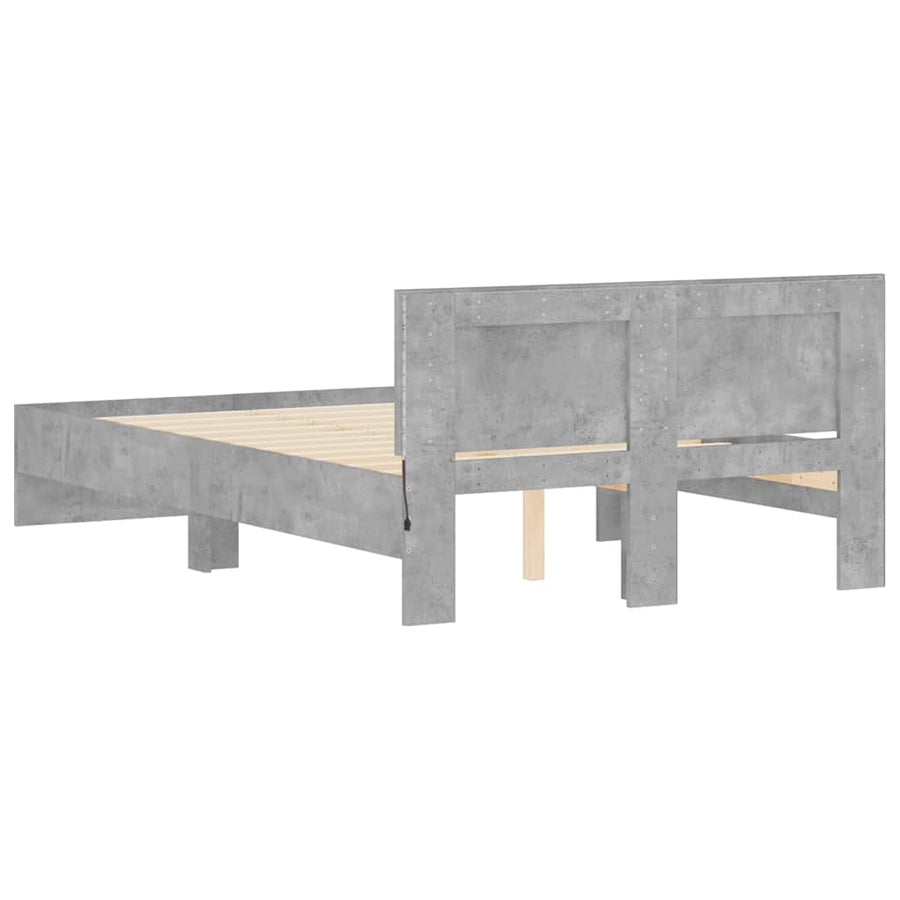 Bedframe met hoofdeinde en LED betongrijs 135x190 cm