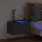 Black wall-mounted nightstand with LEDs