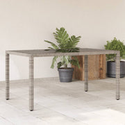 Tuintafel 150x90x75 cm poly rattan glas grijs
