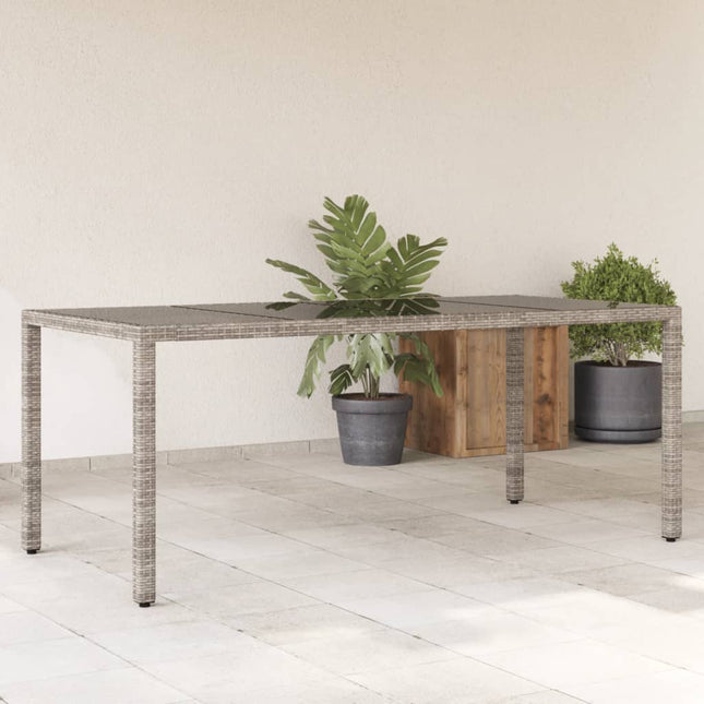 Tuintafel met glazen blad 190x90x75 cm poly rattan grijs