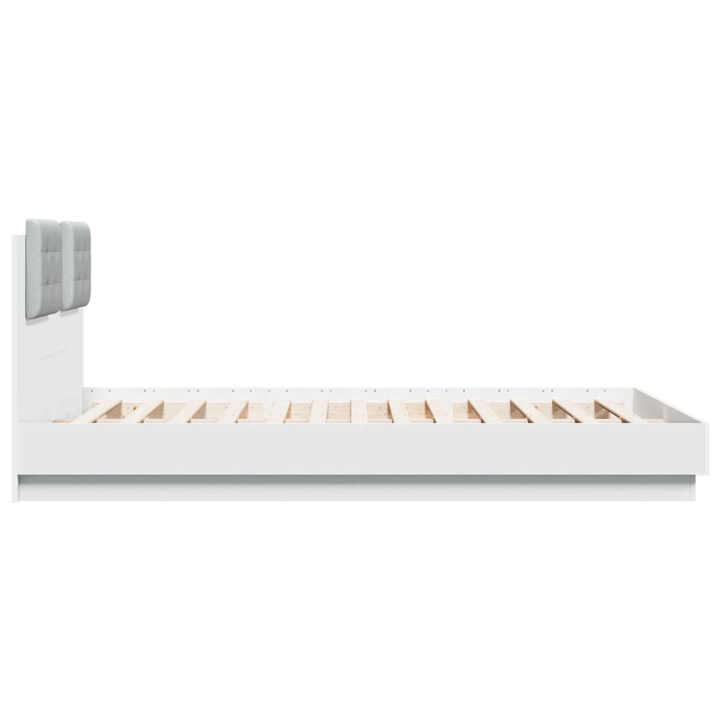 Bedframe met hoofdbord en LED-verlichting wit 140x200 cm