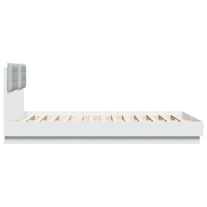 Bedframe met hoofdbord en LED-verlichting wit 140x200 cm
