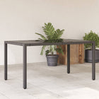 Garden table with glass top 150x90x75 cm poly rattan black