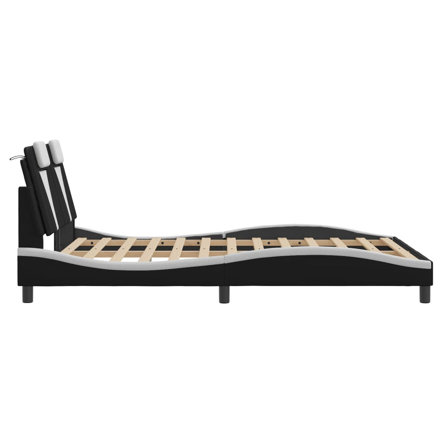 Bedframe met hoofdbord kunstleer zwart en wit 140x200 cm
