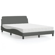 Bed met matras 140x200 cm donkergrijs stof