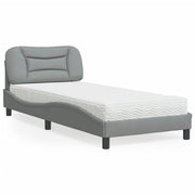 Bed met matras 90x190 cm lichtgrijs stof