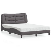 Bed met matras 140x190 cm grijs kunstleer
