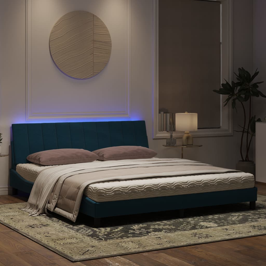 Bedframe met LED-verlichting fluweel blauw 180x200 cm