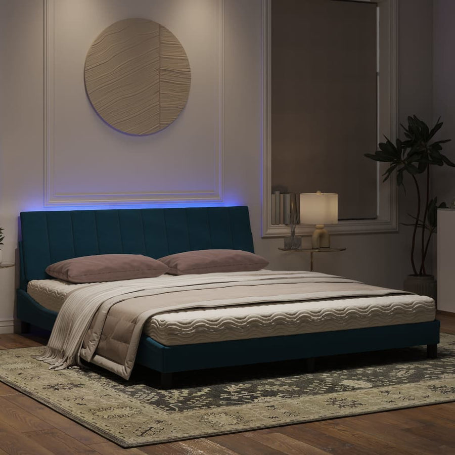 Bedframe met LED-verlichting fluweel blauw 180x200 cm
