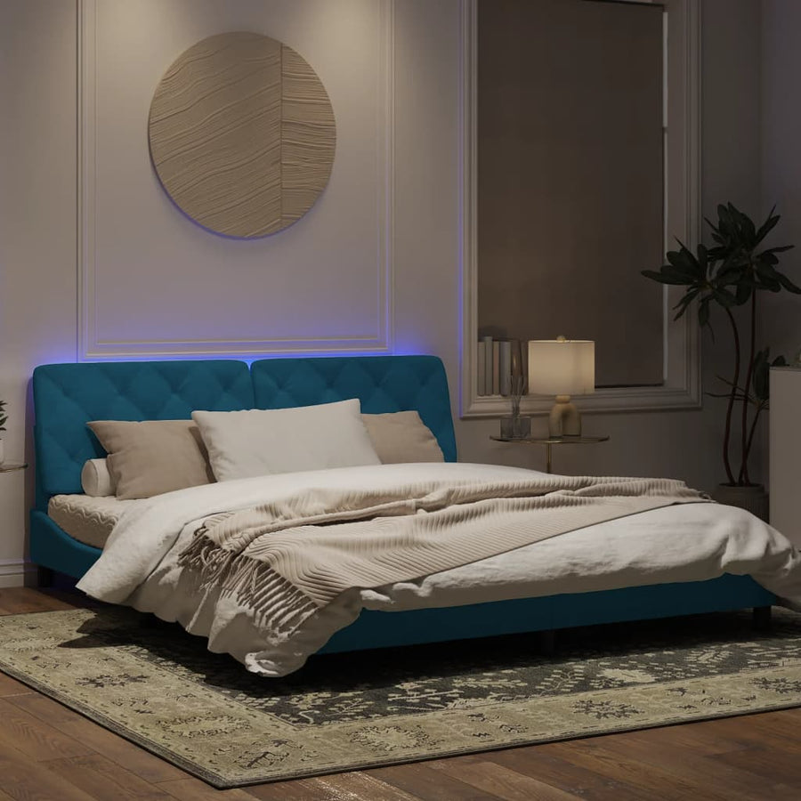 Bedframe met LED-verlichting fluweel blauw 180x200 cm