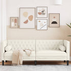 Three-seater Chesterfield-style sofa with bolster pillows, cream velvet