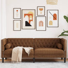 Three-seater Chesterfield-style sofa with bolsters in brown faux suede