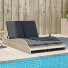 Sun lounger with cushions 114x205x73 cm poly rattan light grey