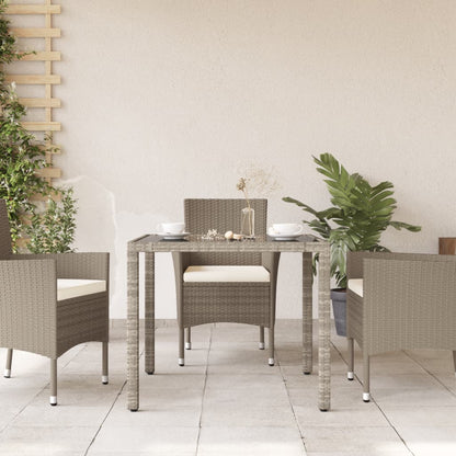 Tuintafel met glazen blad 90x90x75 cm poly rattan lichtgrijs