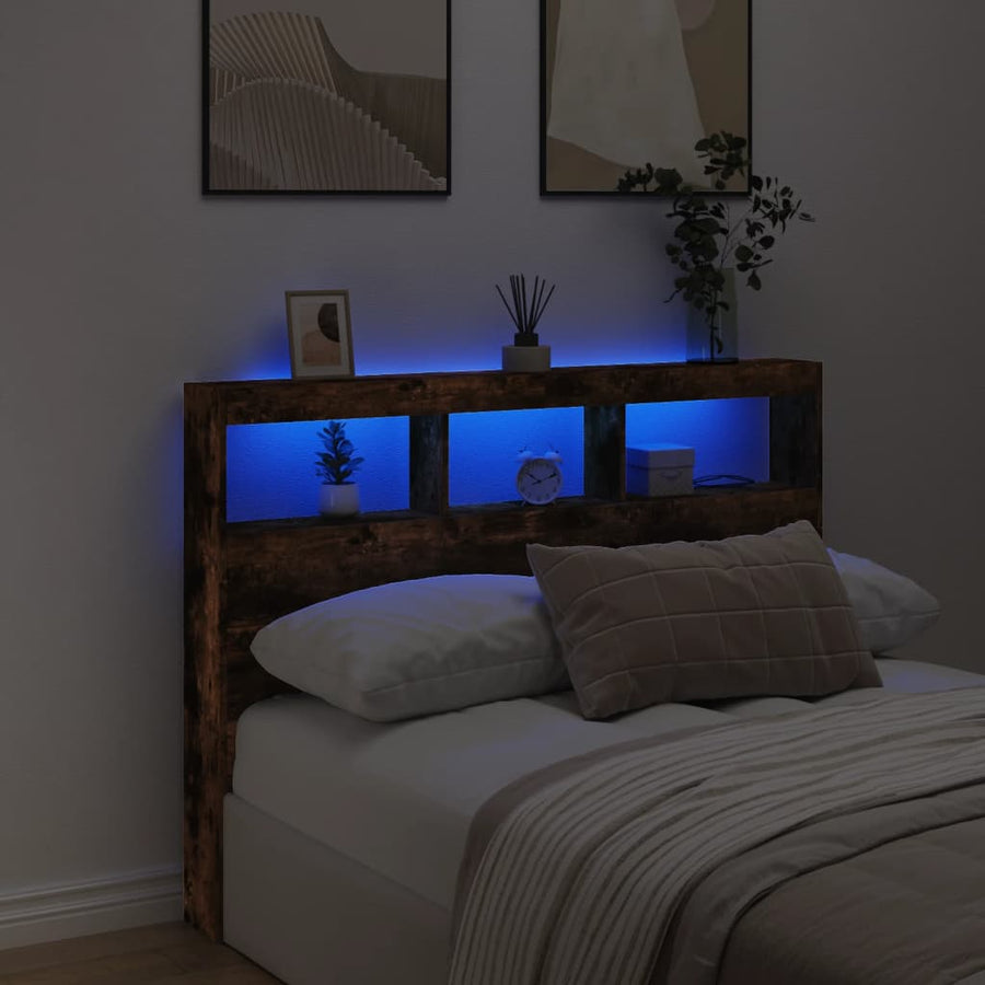 Hoofdbordkast met LED-verlichting 140x17x102 cm gerookt eiken