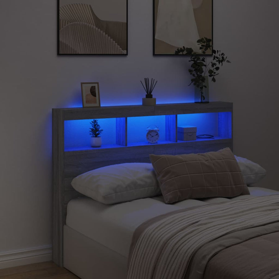Hoofdbordkast met LED-verlichting 140x17x102 cm grijs sonoma