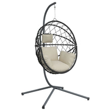 Hangstoel met standaard rattan en staal beige