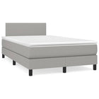 Boxspring met matras en LED stof lichtgrijs 120x190 cm