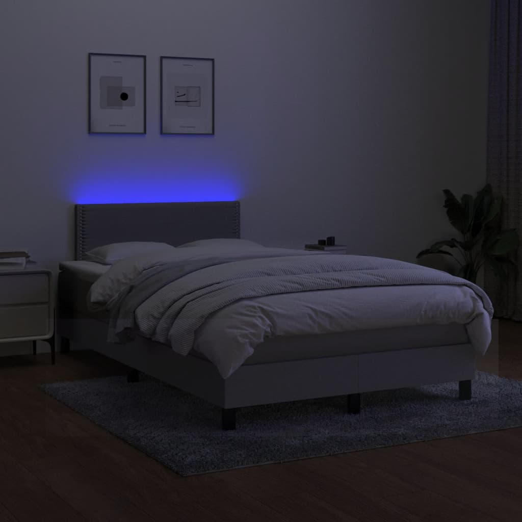 Boxspring met matras en LED stof lichtgrijs 120x190 cm