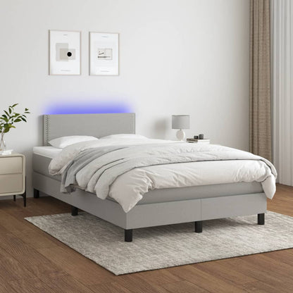 Boxspring met matras en LED stof lichtgrijs 120x190 cm