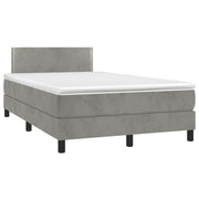 Box spring with mattress and LED velvet light gray 120x190 cm