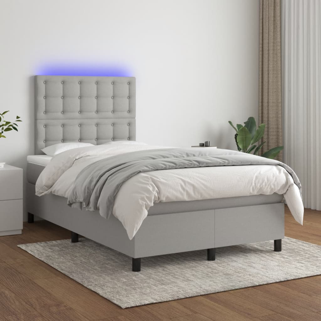 Boxspring met matras en LED stof lichtgrijs 120x190 cm