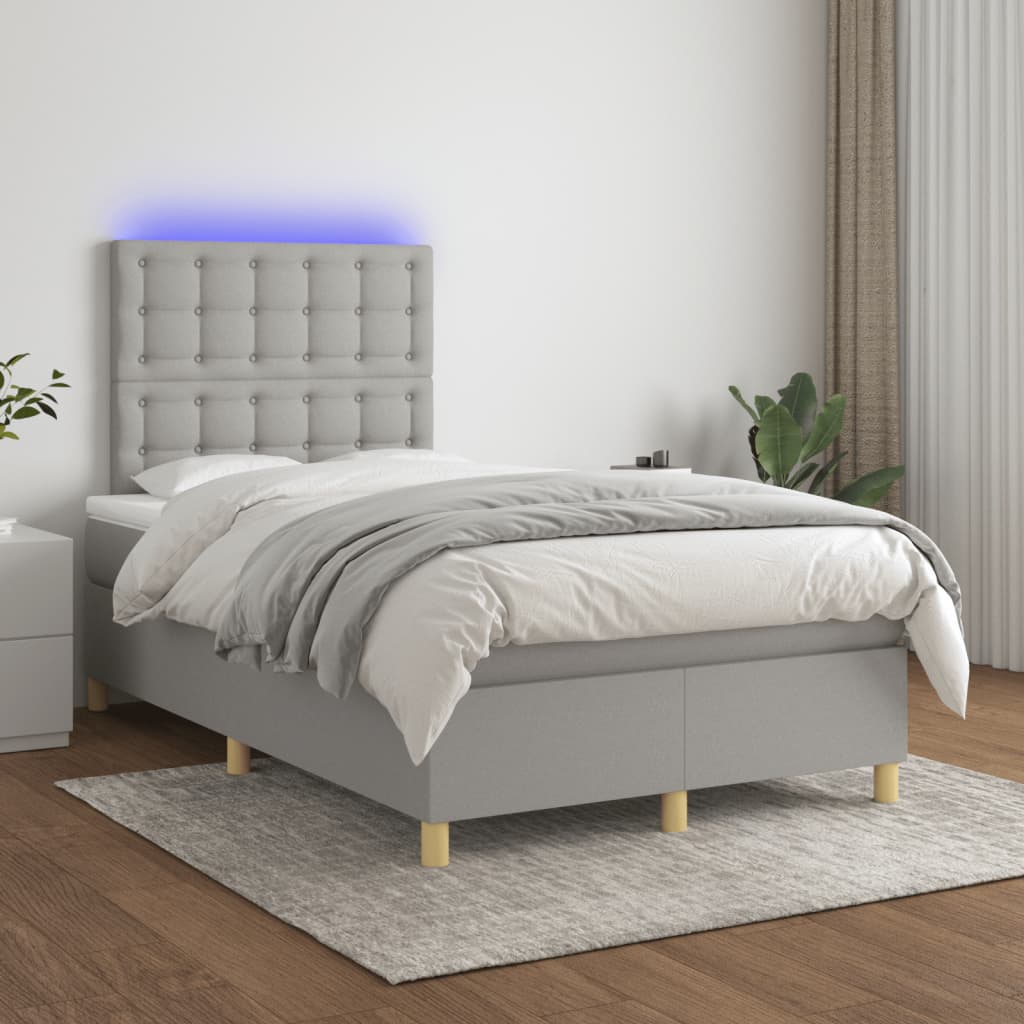 Boxspring met matras en LED stof lichtgrijs 120x190 cm