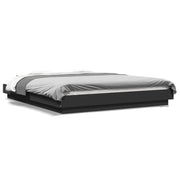 Bedframe 150x200 cm bewerkt hout zwart met LED