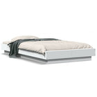 Bed frame with LED lighting engineered wood white 90x200 cm