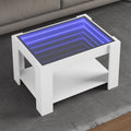 Coffee table with LED 73x53x45 cm engineered wood white