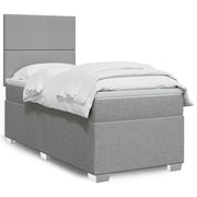 Boxspring met matras 90x190 cm lichtgrijs stof